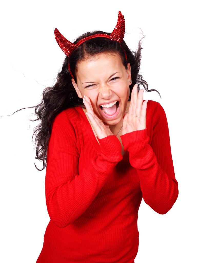 Girl in devil horns and red sweater